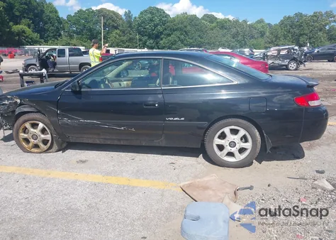 2000 Toyota Camry Solara Se V6/Sle V6 z USA, uszkodzony, nr VIN 2T1CF22P5YC323186